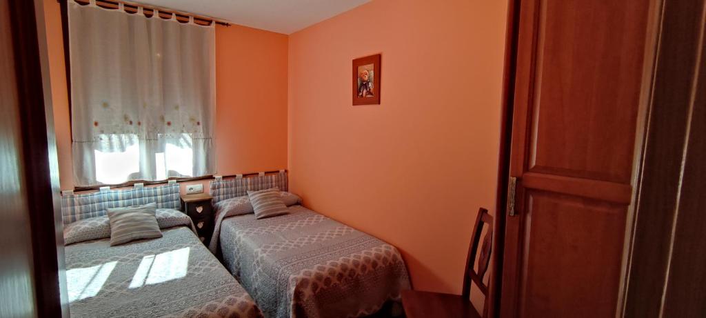 Postel nebo postele na pokoji v ubytování Casa Cote