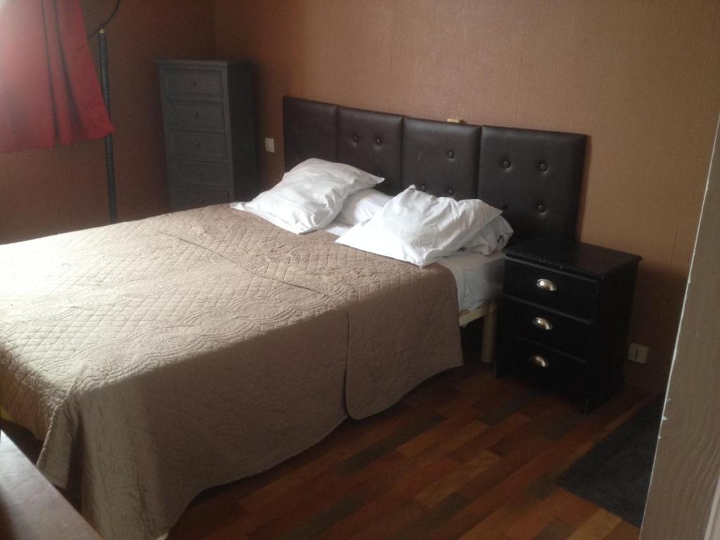 Postel nebo postele na pokoji v ubytování Hotel Moderne