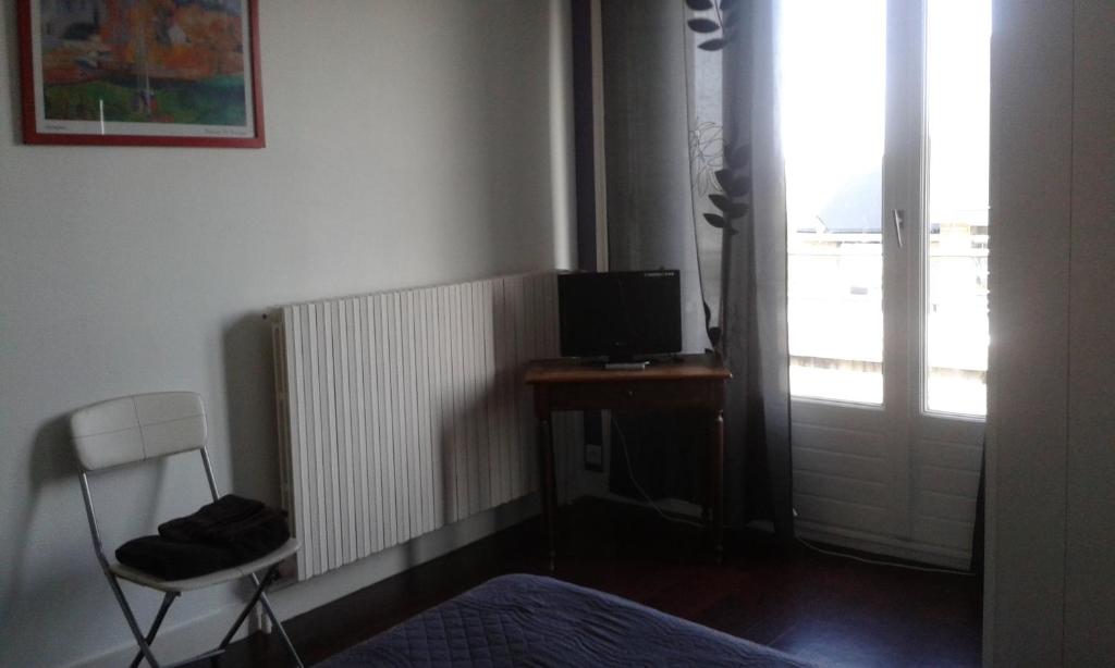 TV a/nebo společenská místnost v ubytování Hotel Moderne
