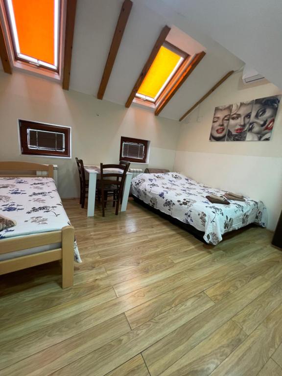 Postel nebo postele na pokoji v ubytování Bulevar Apartments