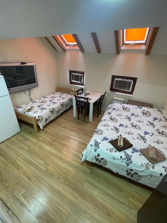 Postel nebo postele na pokoji v ubytování Bulevar Apartments