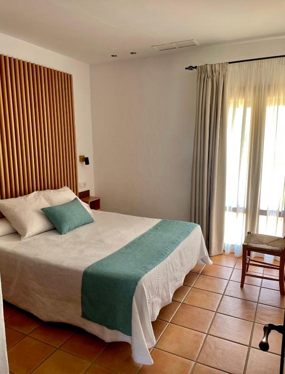 Postel nebo postele na pokoji v ubytování Apartamentos Villafaro Conil