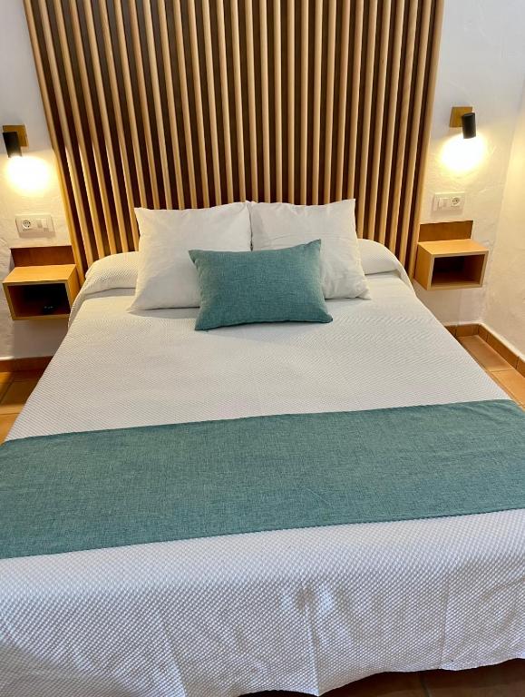 Postel nebo postele na pokoji v ubytování Apartamentos Villafaro Conil