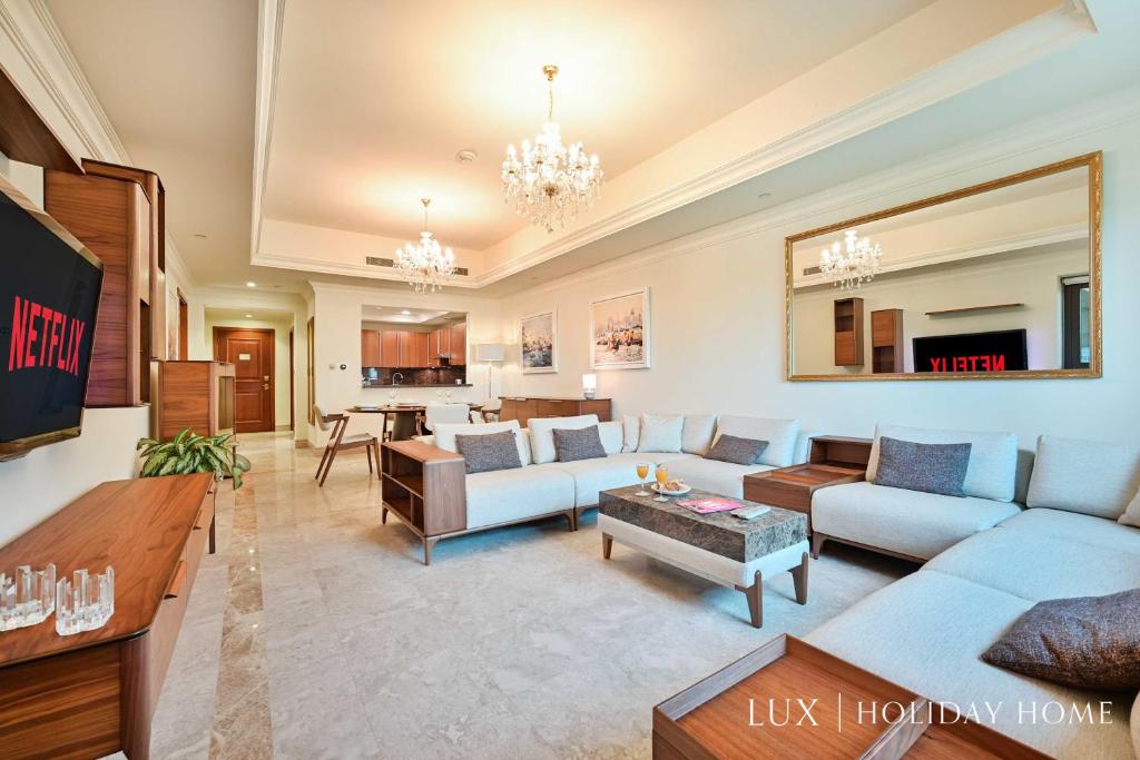 A seating area at LUX The Elegant Fairmont Palm Suite