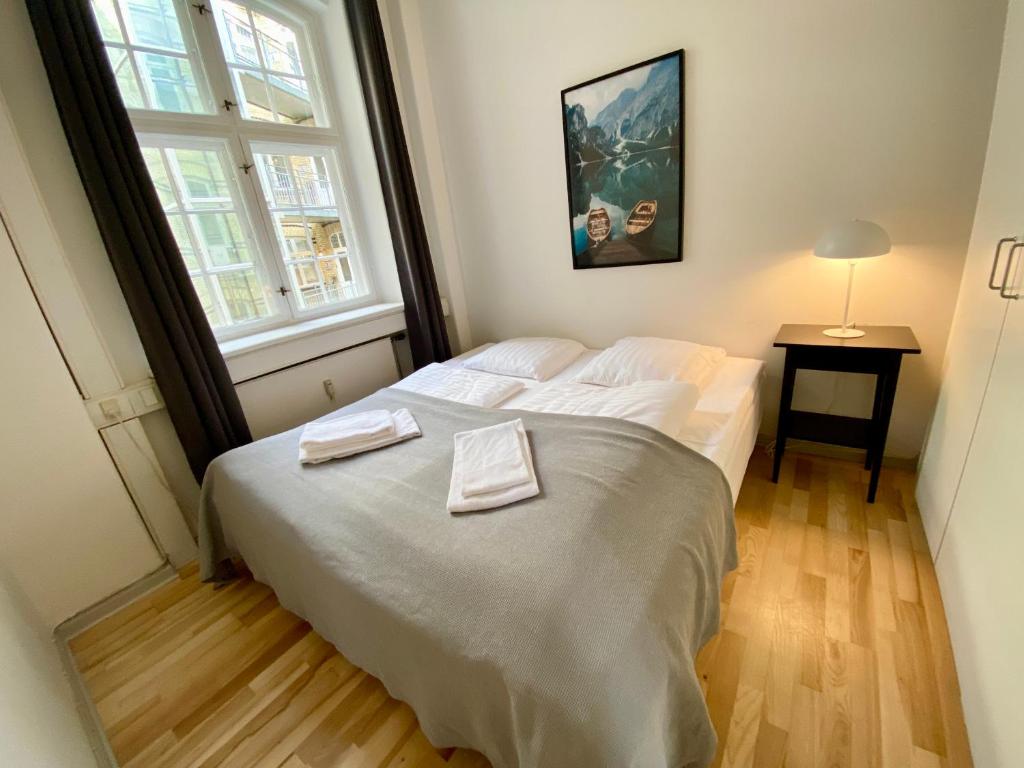 Postel nebo postele na pokoji v ubytování Gothersgade 101C