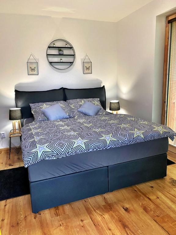 Postel nebo postele na pokoji v ubytování Apartmán NatEmi u sjezdovky Filipovice