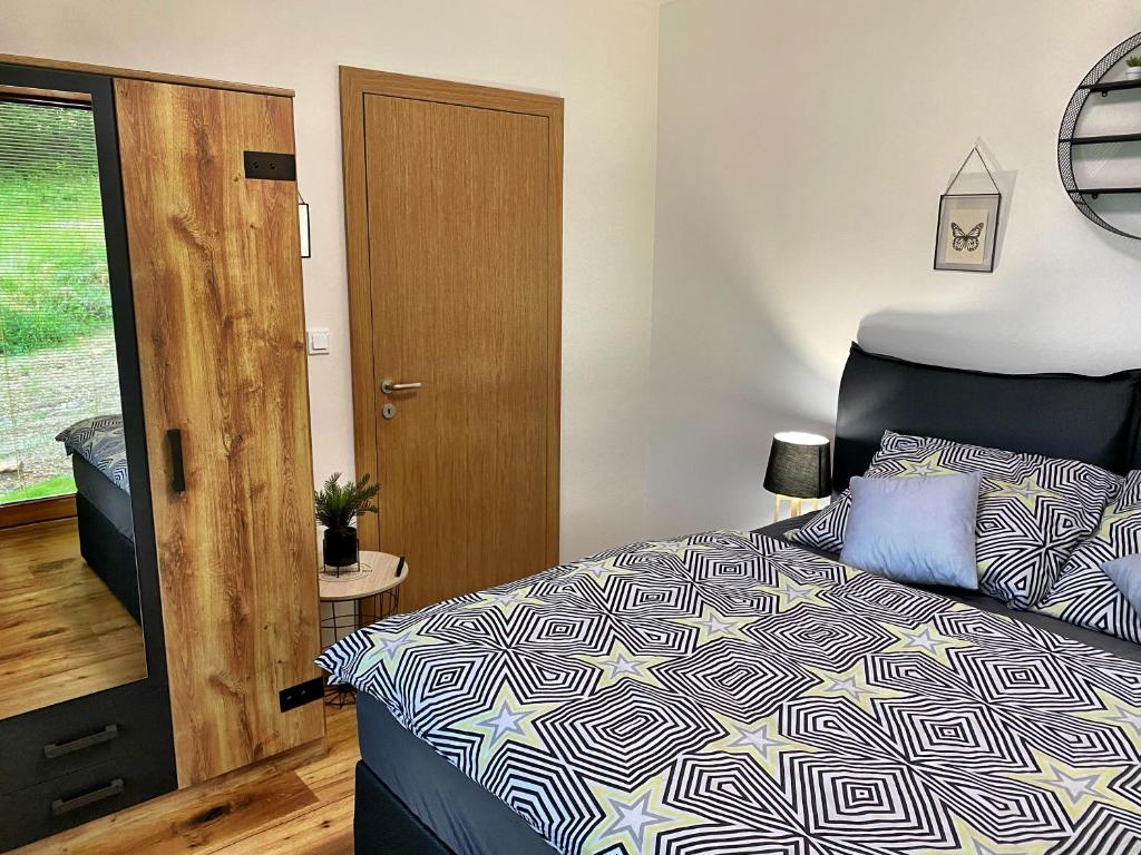 Postel nebo postele na pokoji v ubytování Apartmán NatEmi u sjezdovky Filipovice