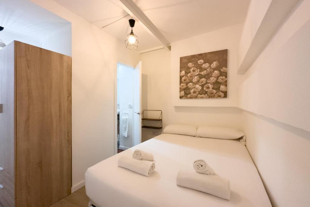 Ein Bett oder Betten in einem Zimmer der Unterkunft Apartamento de 1 dormitorio