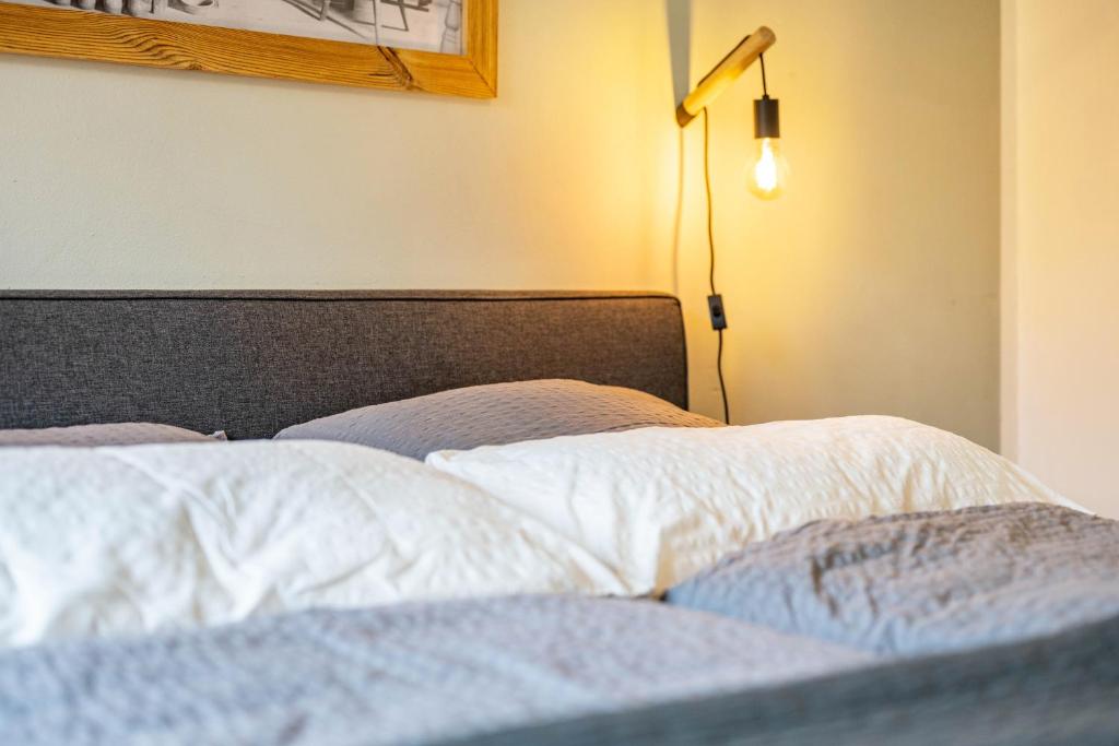 Łóżko lub łóżka w pokoju w obiekcie Valentin36 Apartment Raschötz