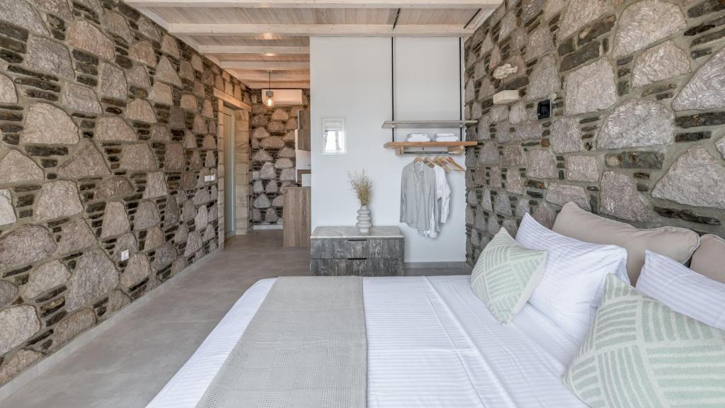Postel nebo postele na pokoji v ubytování Thea Sunset Suites