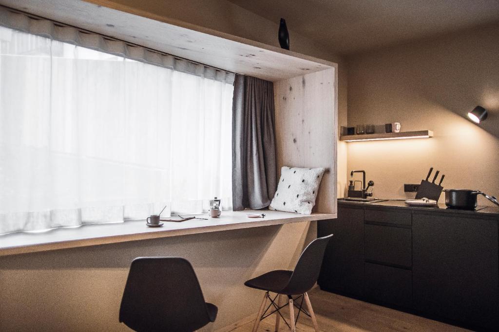 Kuchyň nebo kuchyňský kout v ubytování Rousa little guesthouse Cosy