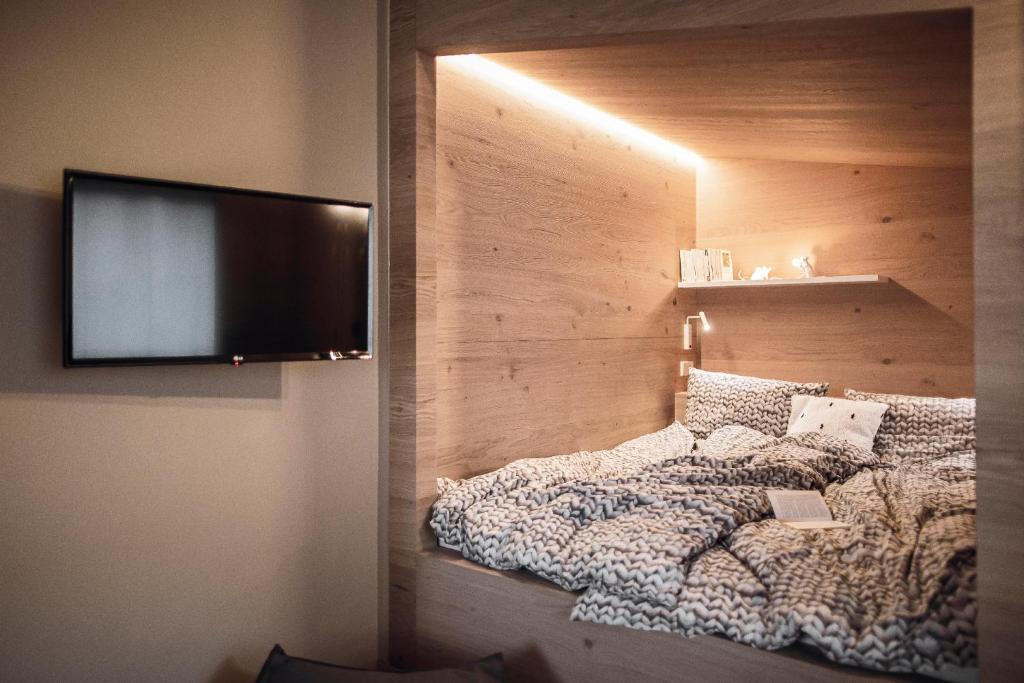 Postel nebo postele na pokoji v ubytování Rousa little guesthouse Cosy