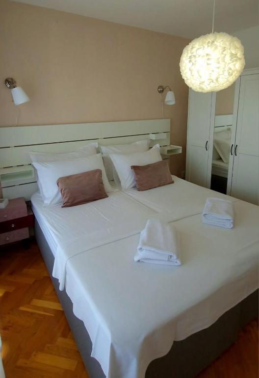 Posteľ alebo postele v izbe v ubytovaní Ocean apartman