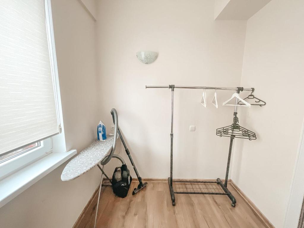 a room with a stand up shower in the corner at RentHouse Apartments Relax Studio in Chişinău