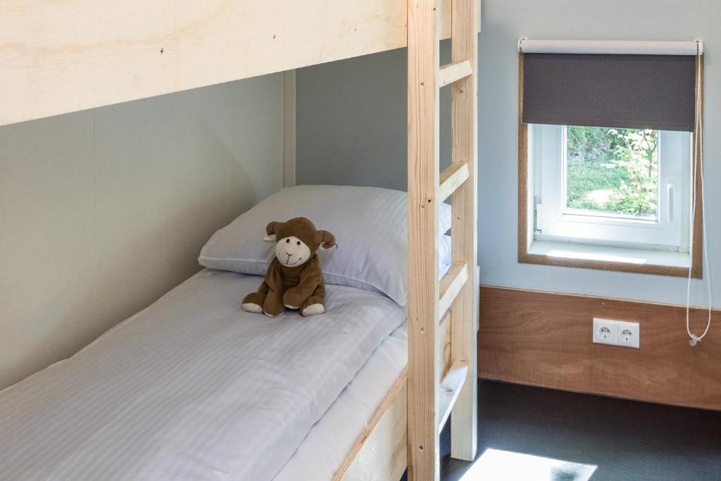 Postel nebo postele na pokoji v ubytování Residence de Eese