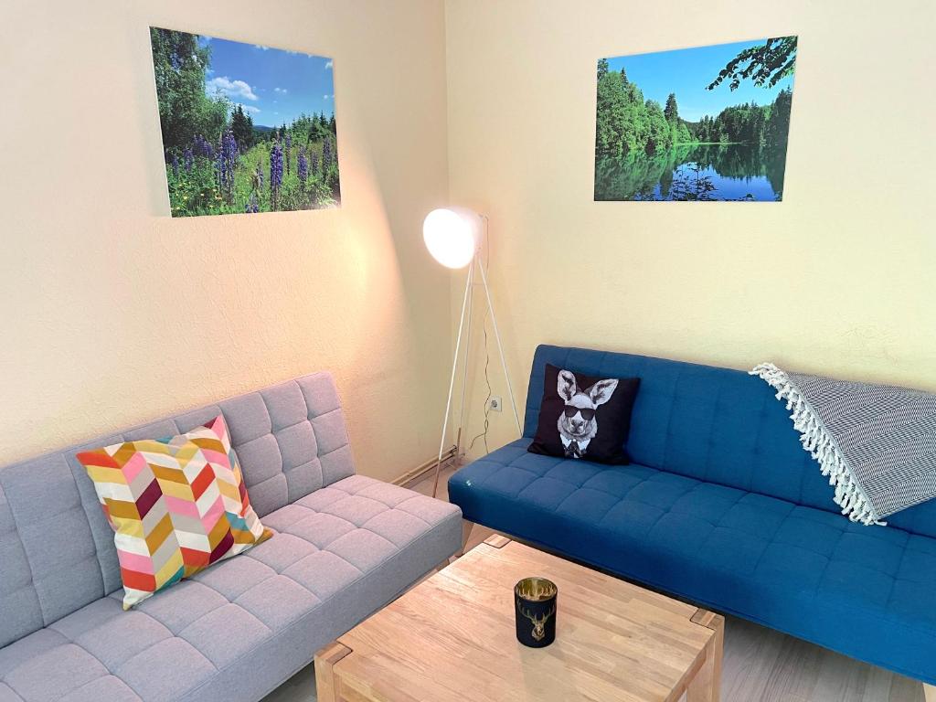 Posezení v ubytování Vor lauter Bäumen B&B