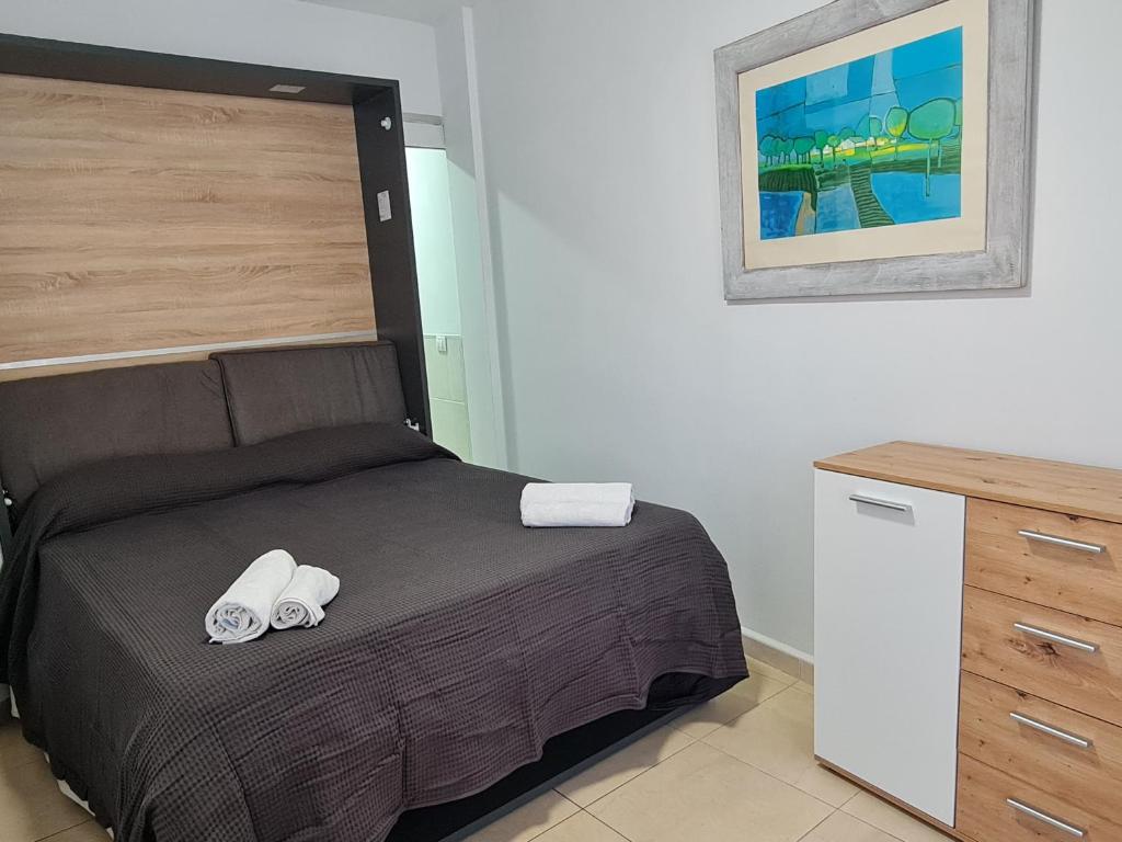 Posteľ alebo postele v izbe v ubytovaní Casa Natalia