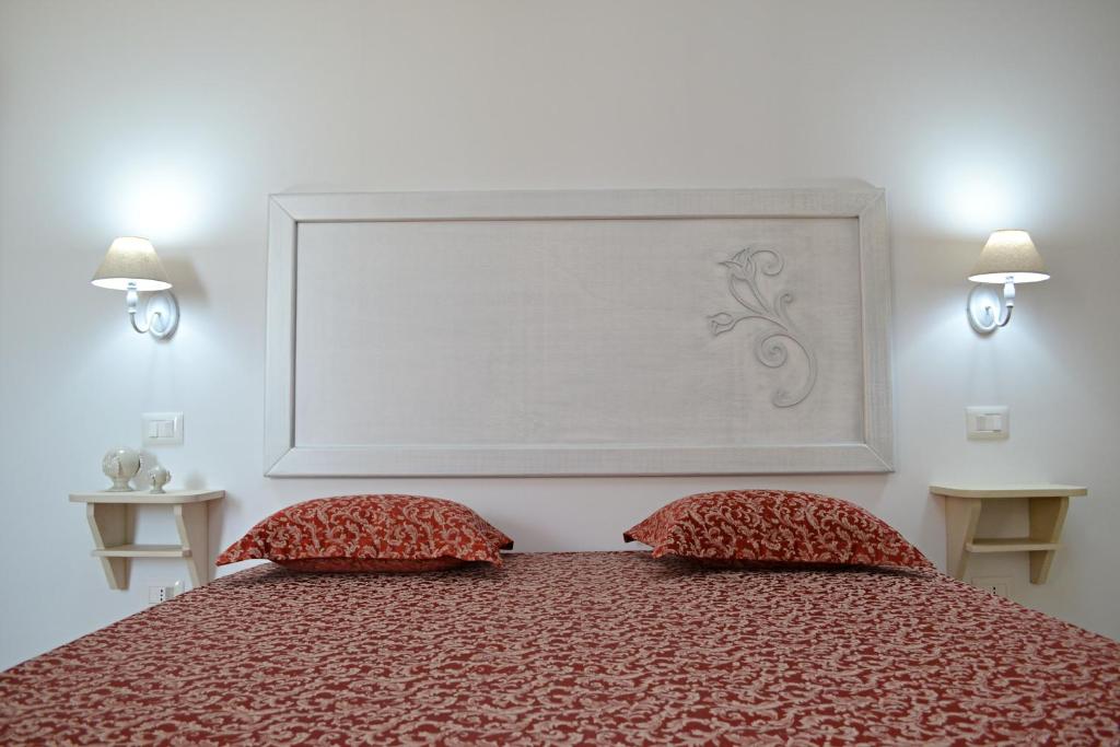 Łóżko lub łóżka w pokoju w obiekcie Arbor Exclusive B&B