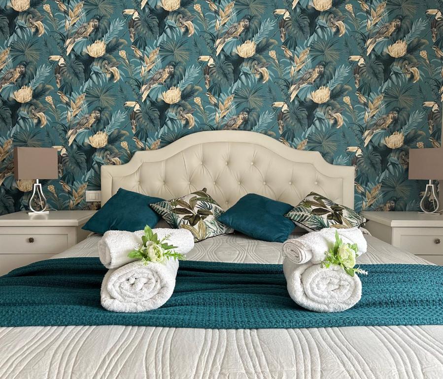 A bed or beds in a room at Anema & Core Home