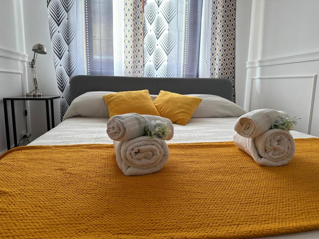 A bed or beds in a room at Anema & Core Home
