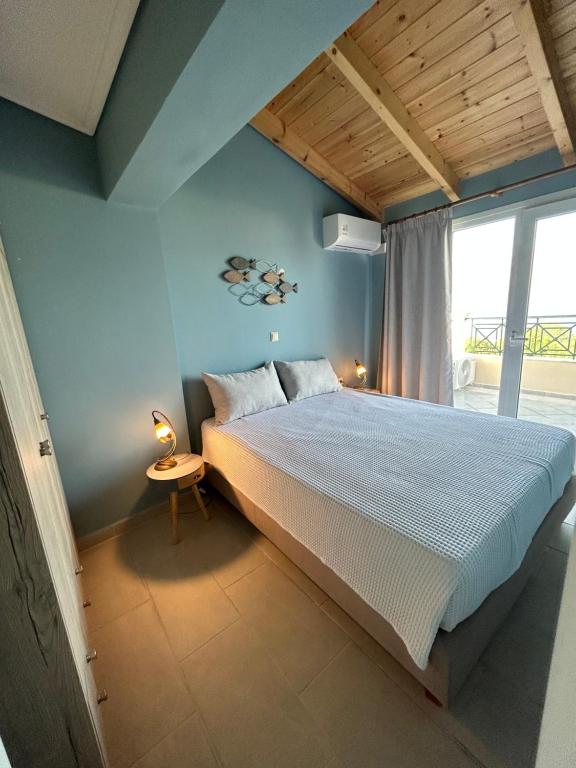 Postel nebo postele na pokoji v ubytování Emelia Apartment