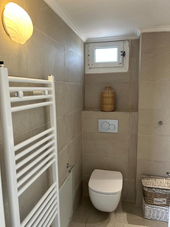 Koupelna v ubytování Emelia Apartment