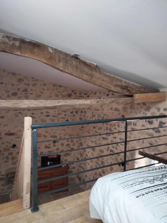 Postel nebo postele na pokoji v ubytování La Grange de Sabatas