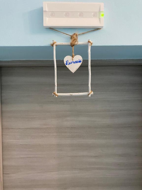 a swing in a room with a heart on it at Villa Valentina Versilia in Viareggio