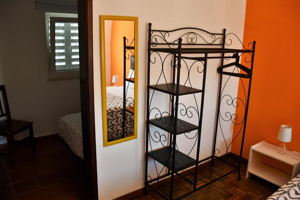 Postel nebo postele na pokoji v ubytování Alojamentos Vitinho - Vila Nova Milfontes