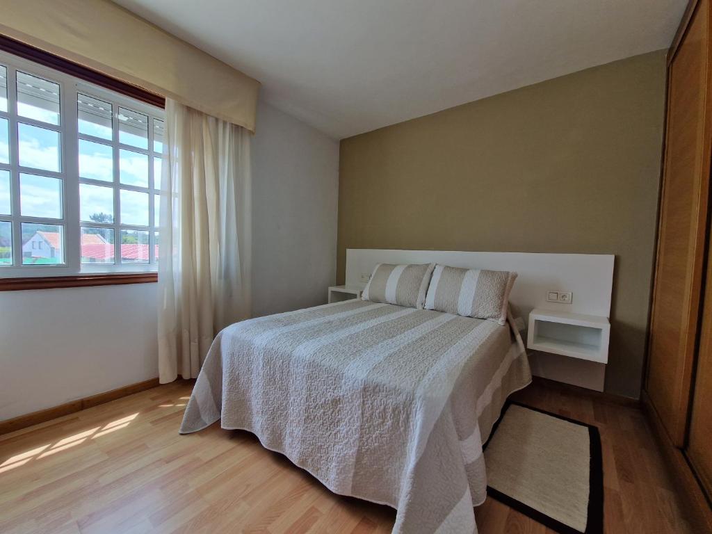 Postel nebo postele na pokoji v ubytování Apartamento cerca de la playa