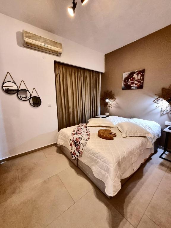 Postel nebo postele na pokoji v ubytování Bellos House