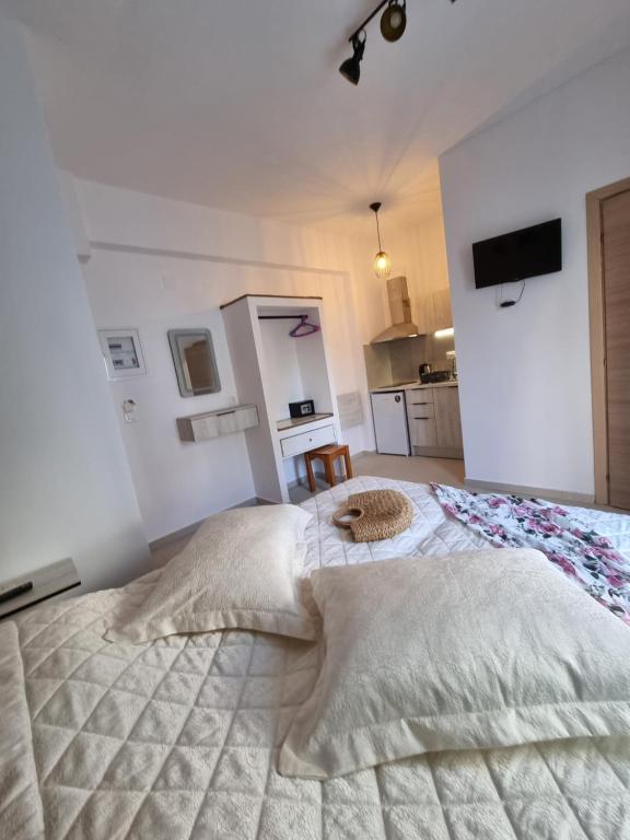 Postel nebo postele na pokoji v ubytování Bellos House