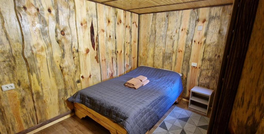Postel nebo postele na pokoji v ubytování Kolyba Complex