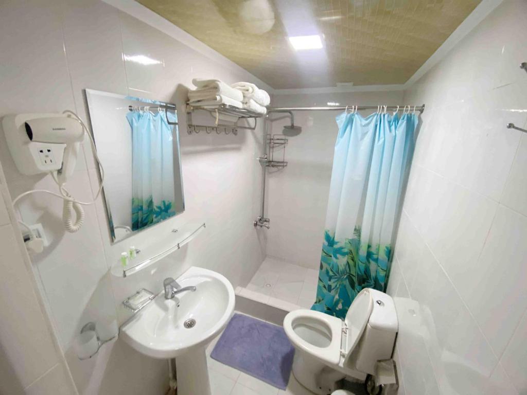 Polvon Ota Hotel - Triple Room