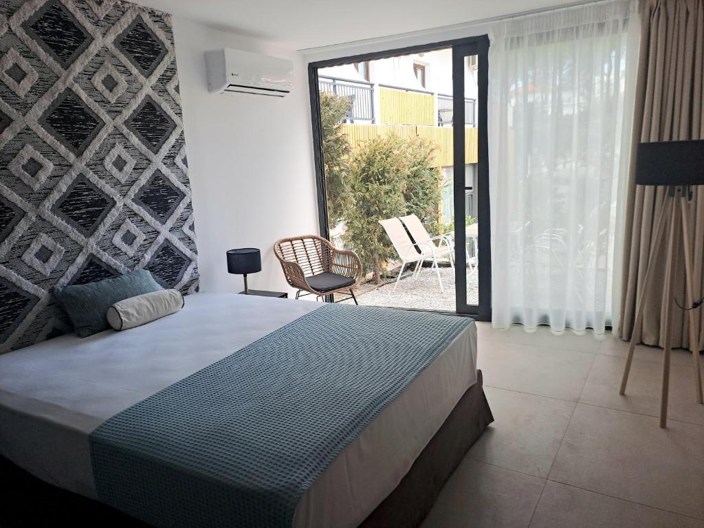 Postel nebo postele na pokoji v ubytování Beach Hotel Kapahi