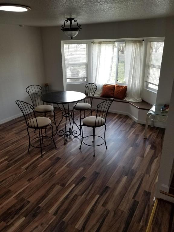 a dining room with a table and chairs in a room at 3 Bedroom By River Park & Trails in Loveland
