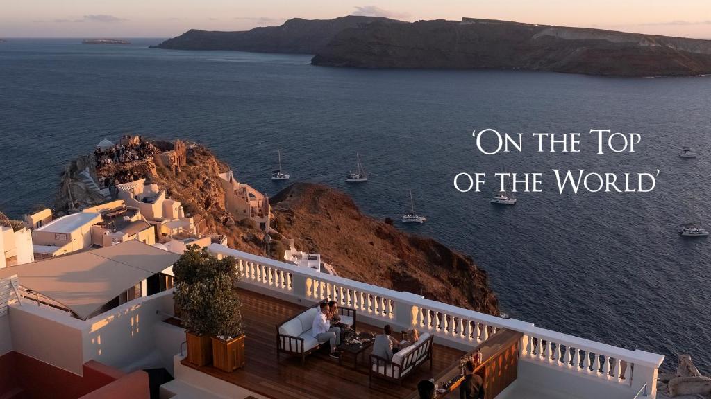 on the top of the world vacation quotes at Oia Mansion in Oia