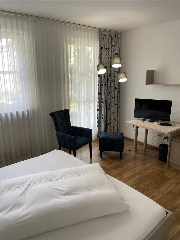 Postel nebo postele na pokoji v ubytování Hotel Gasthof Krapp