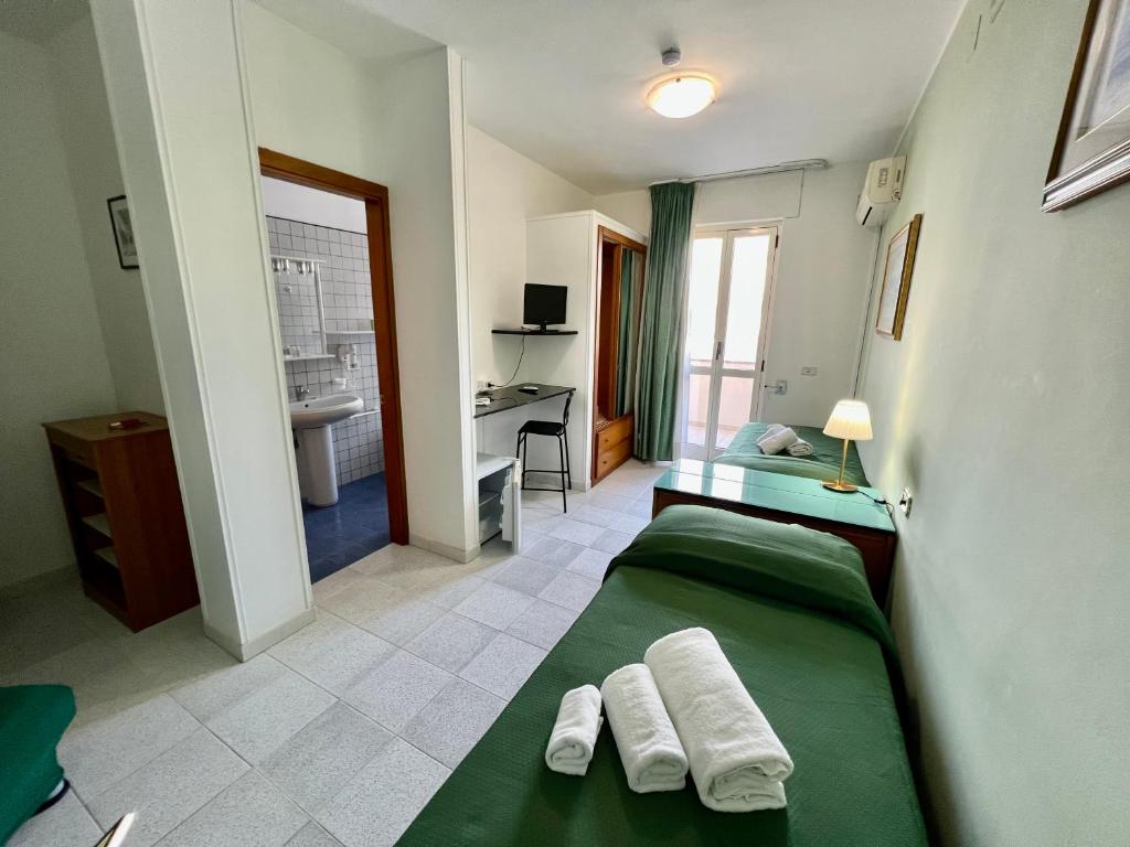 TV a/nebo společenská místnost v ubytování Hotel Minerva