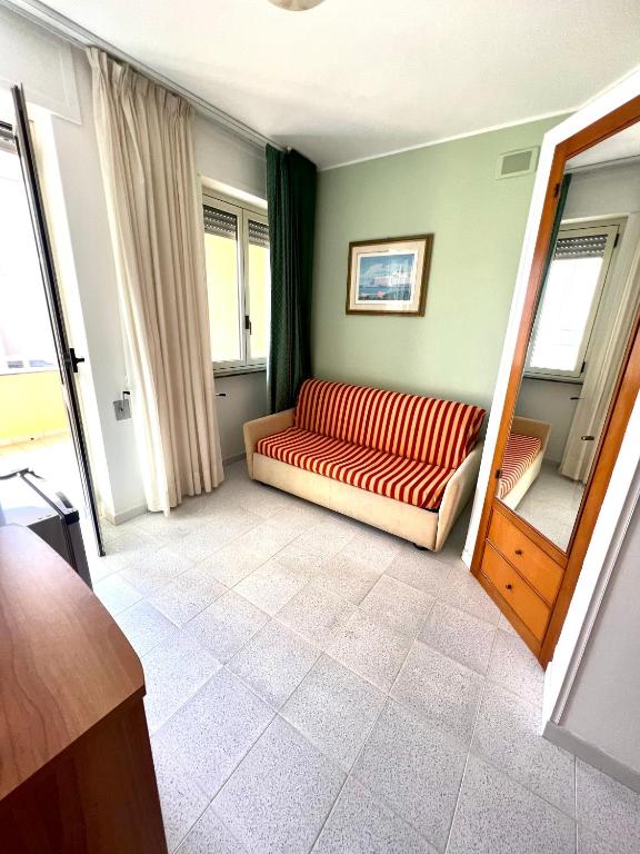Postel nebo postele na pokoji v ubytování Hotel Minerva