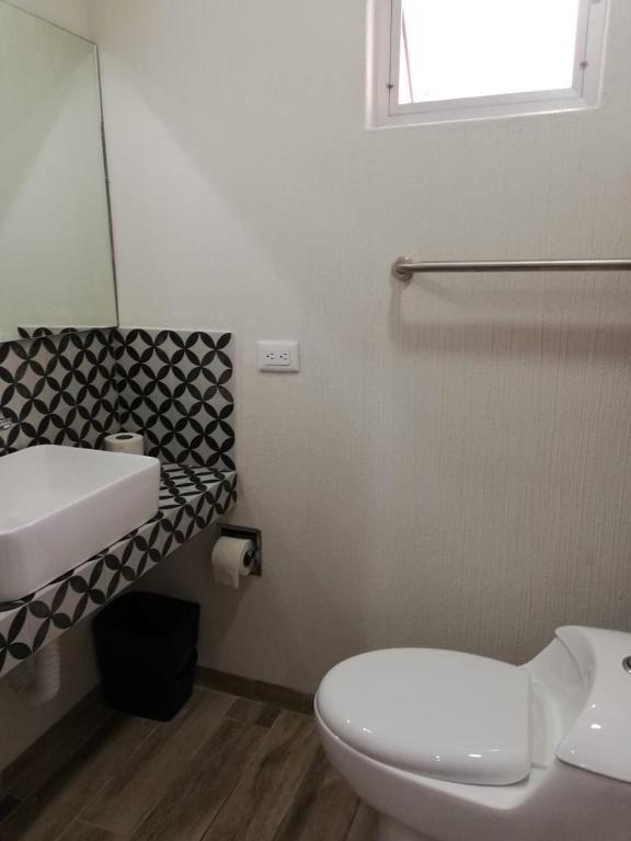 Koupelna v ubytování Hotel Gallo