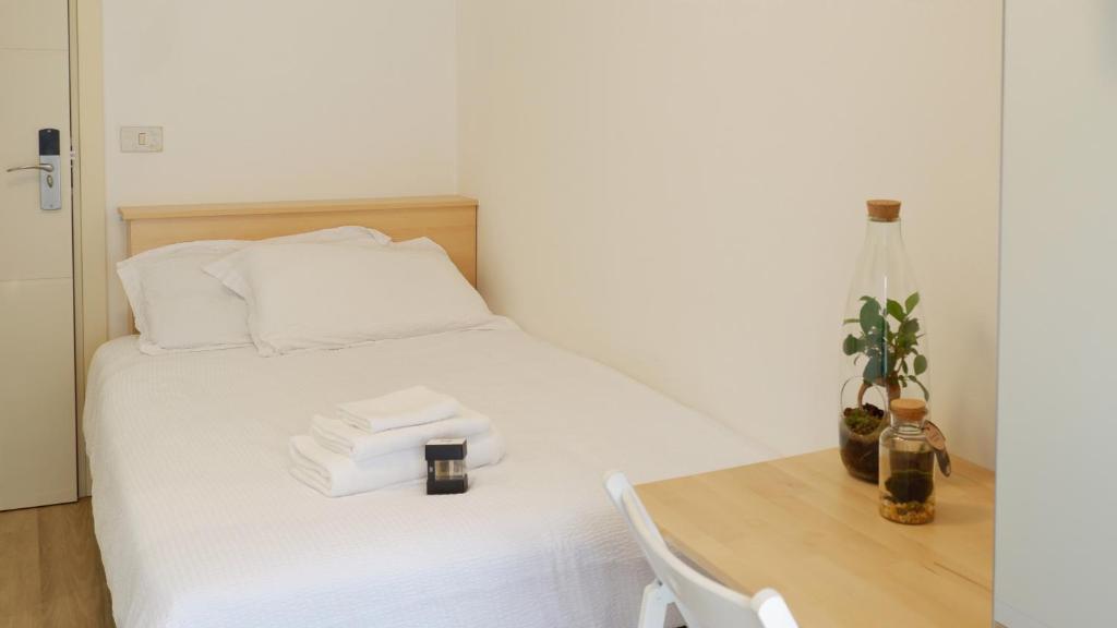 Postel nebo postele na pokoji v ubytování Hotel Venezuela