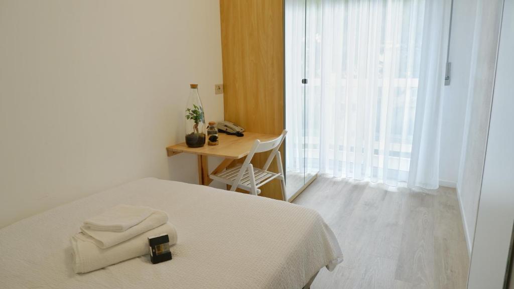 Postel nebo postele na pokoji v ubytování Hotel Venezuela