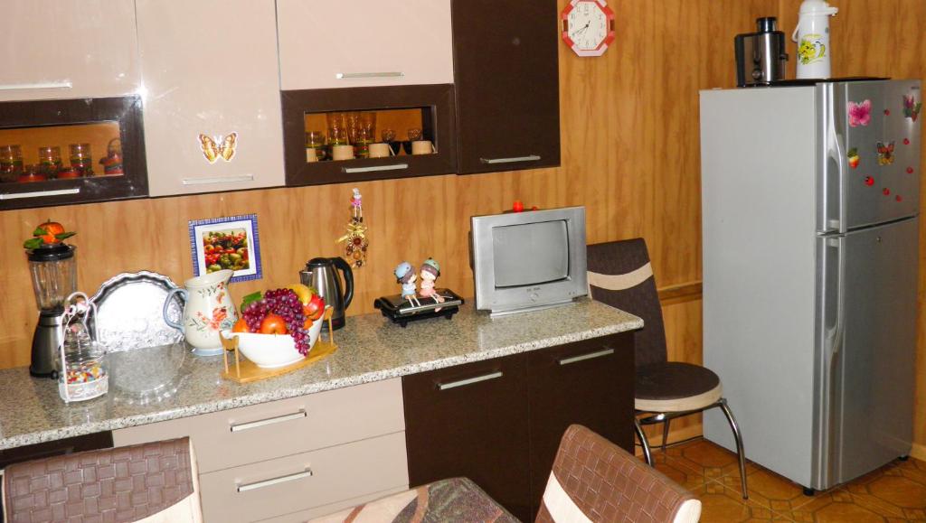 Kuchyň nebo kuchyňský kout v ubytování Gio's Home