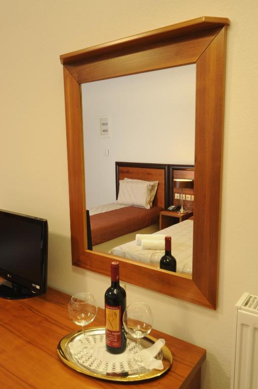 Telewizja i/lub zestaw kina domowego w obiekcie Philippeio Hotel