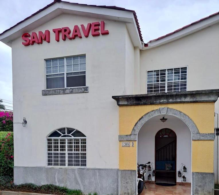 a white building with a san francisco sign on it at SAM TRAVEL in Managua