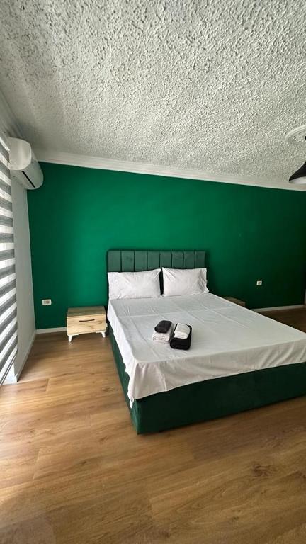 Postel nebo postele na pokoji v ubytování Host Elios Tirana