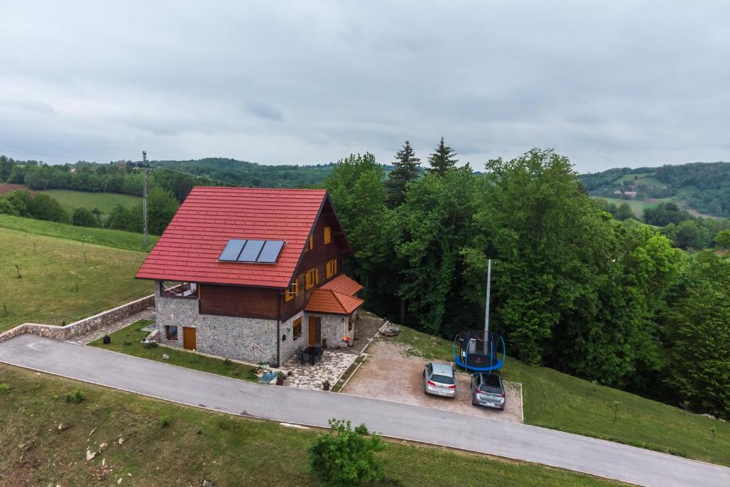 an aerial view of a house with a red roof at Apartment Stone and Wood in Cetingrad
