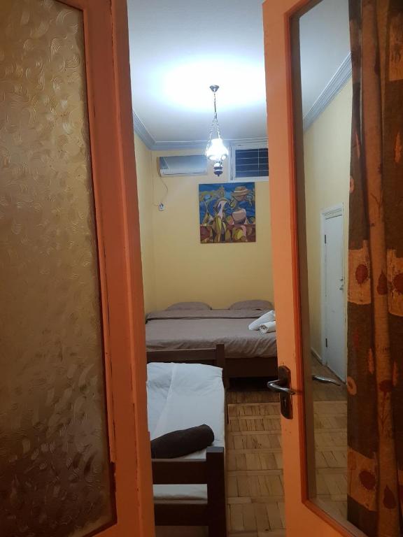 Postel nebo postele na pokoji v ubytování Hostel ERA