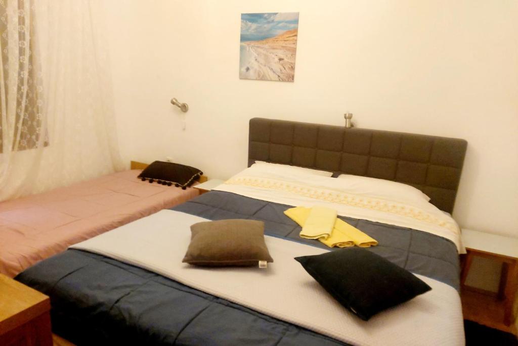 Postel nebo postele na pokoji v ubytování Apartman Arija-Pino